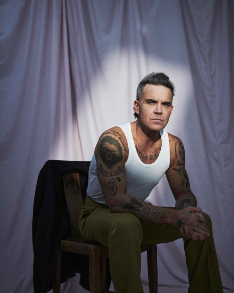Robbie Williams. Crediti per la foto: Jason Hetherington