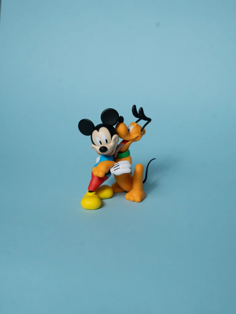 per il 95° anniversario di Pluto, la statuina 3D con Topolino